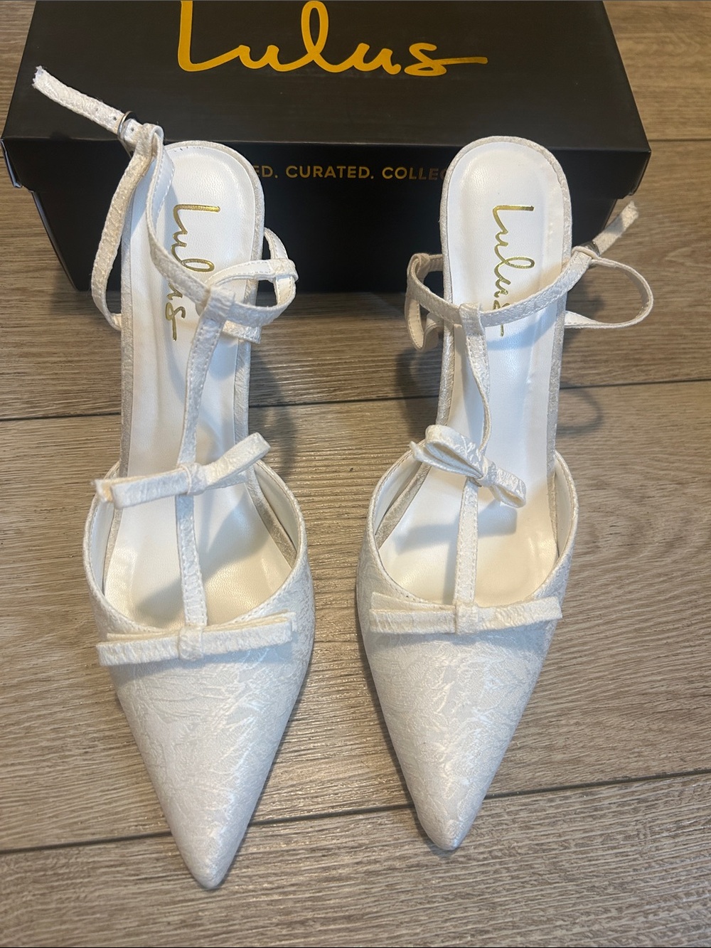 Lulu's White Pointed T-Strap Bow Heels